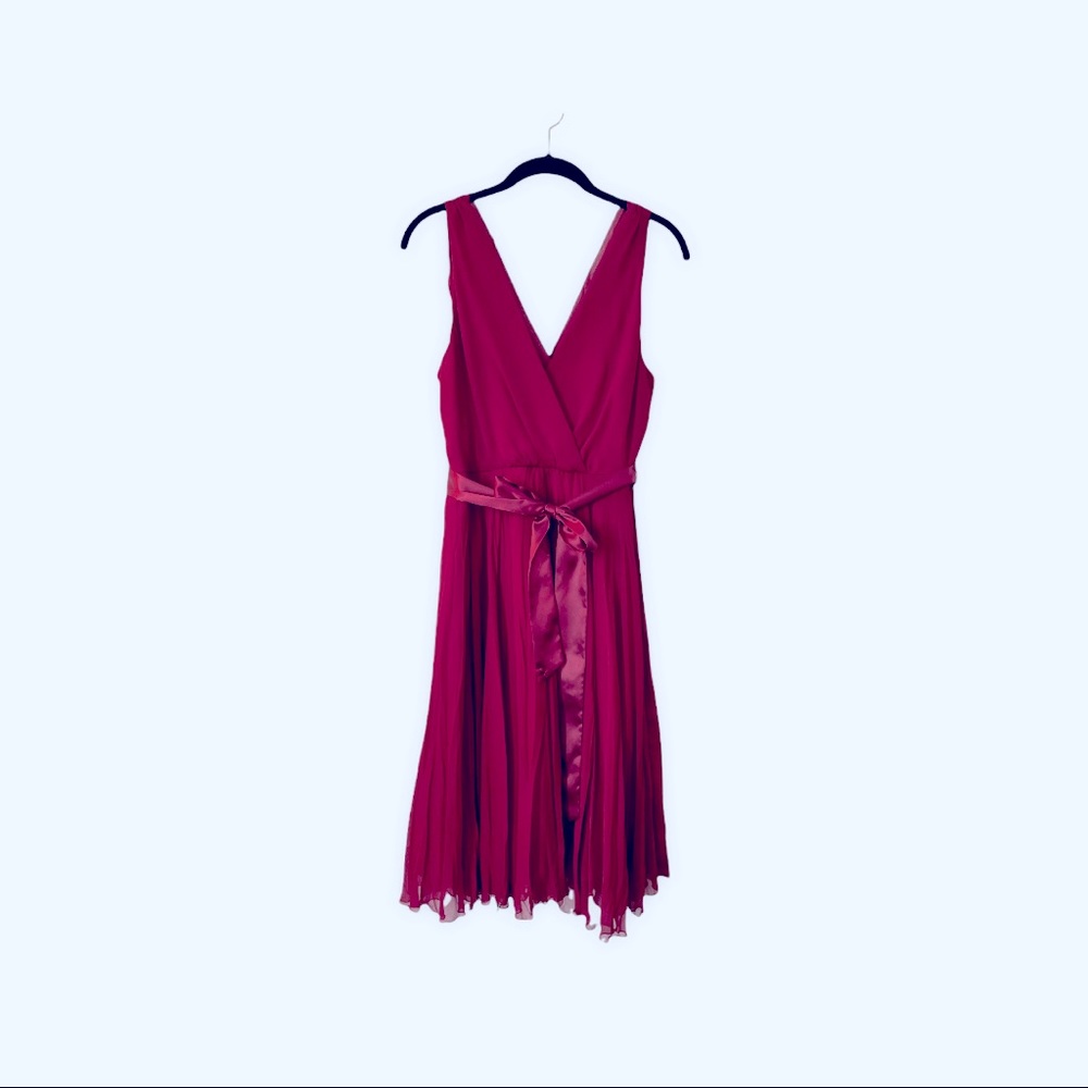 Beautiful Burgundy party dress with satin Ribbon. Size 14